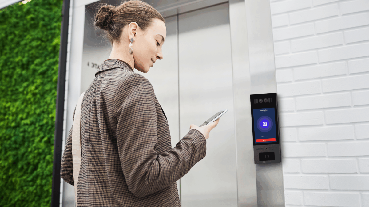 woman using an intercom system