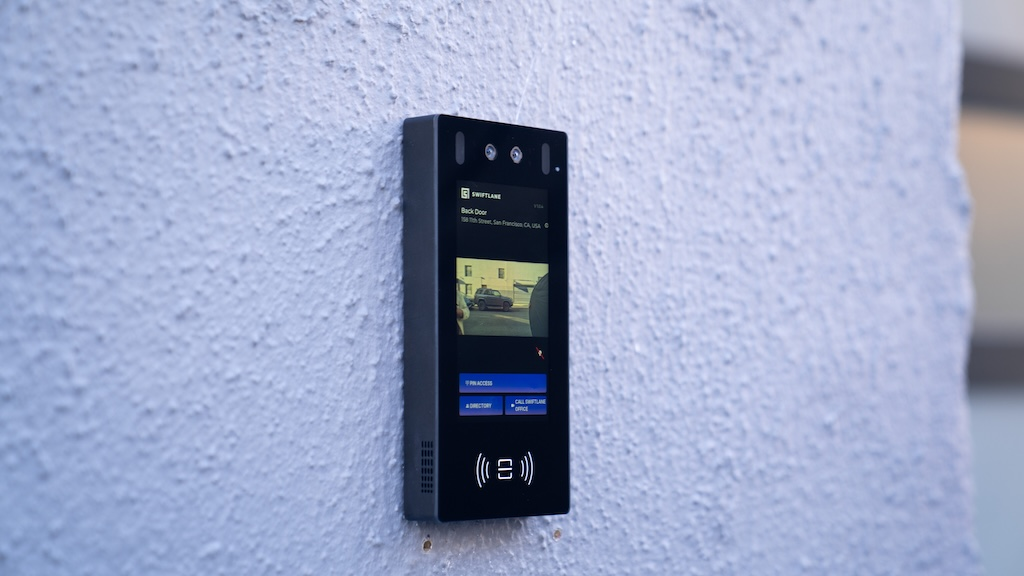 Swiftlane intercom mounted on a wall