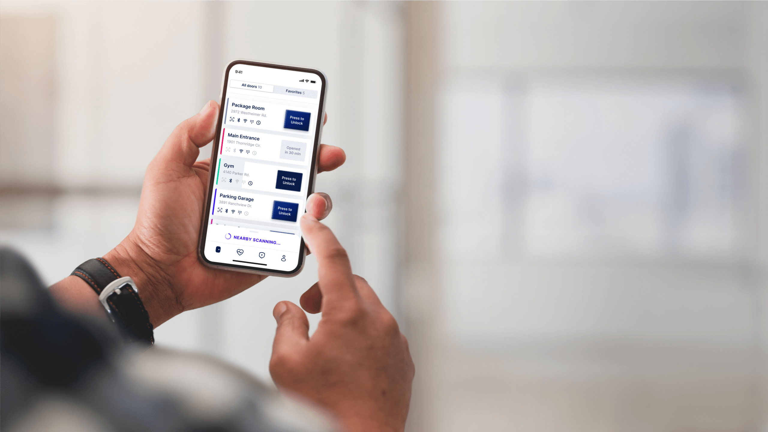 person using Swiftlane mobile application to open doors remotely