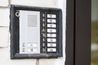 traditional apartment intercom at building entrance