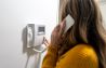 woman talking on the home intercom