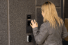 businesswoman using intercom