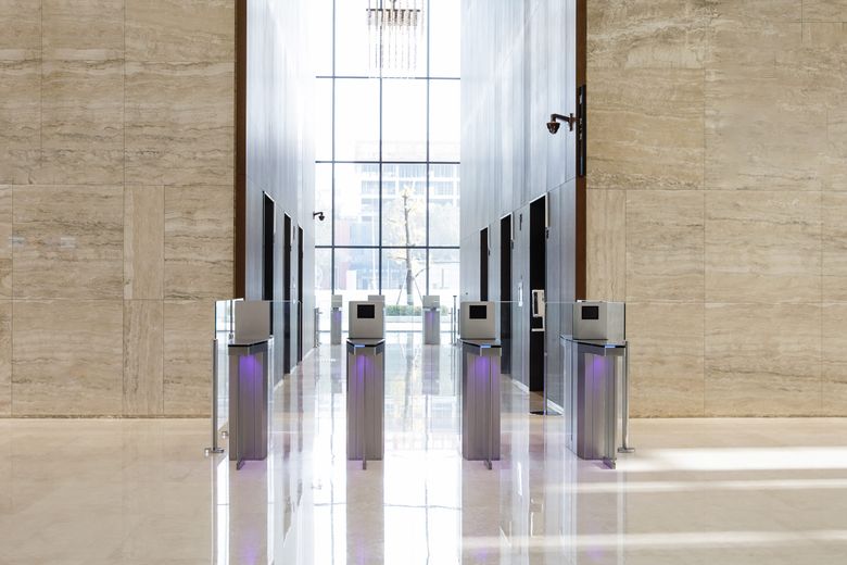 Electronic card reader at office security gate