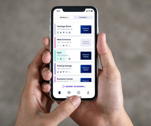 Person holding Swiftlane mobile app door unlock
