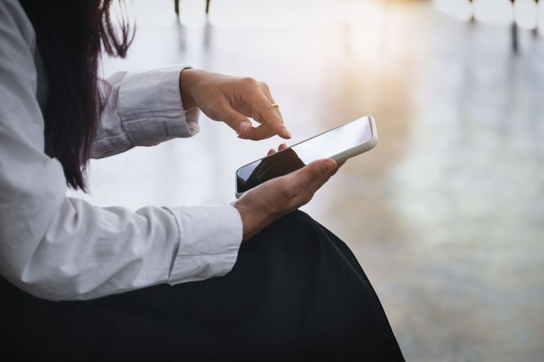 woman using her mobile phone